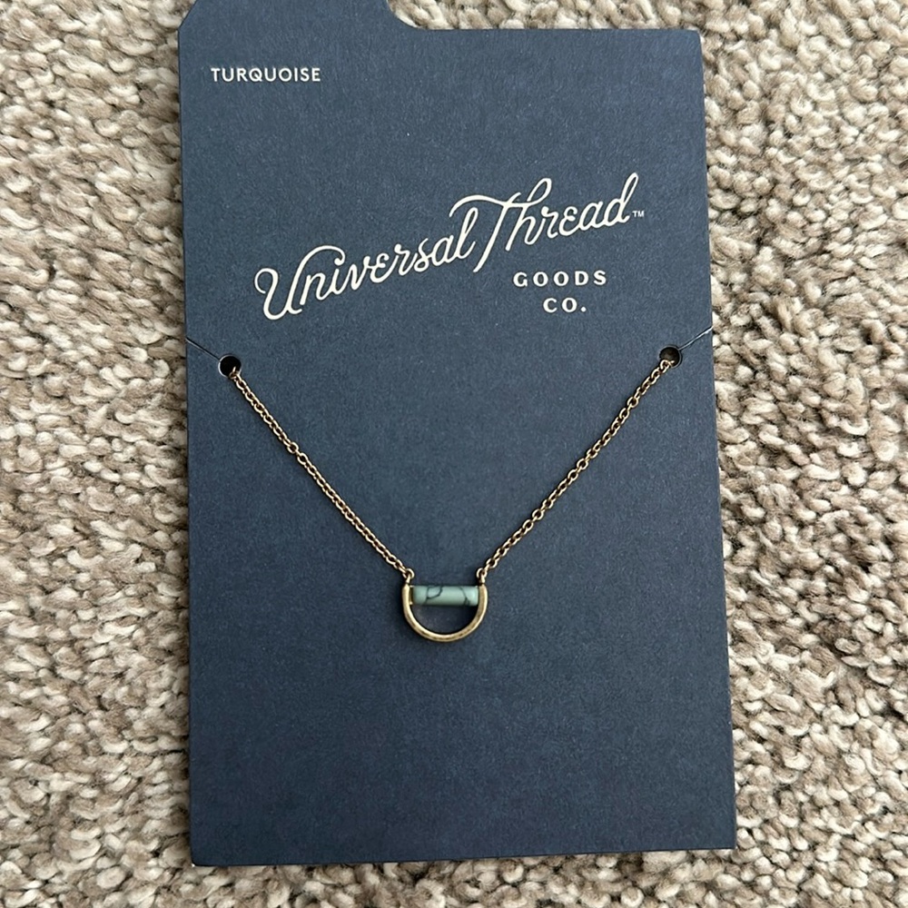 Universal Thread necklace gold color with turquoise. Never opened.